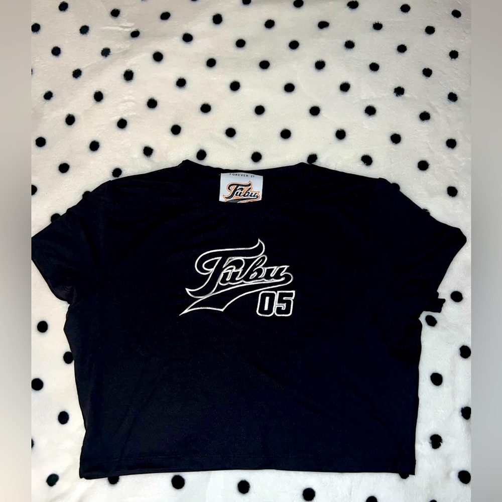 "FOR US BUY US” - FUBU